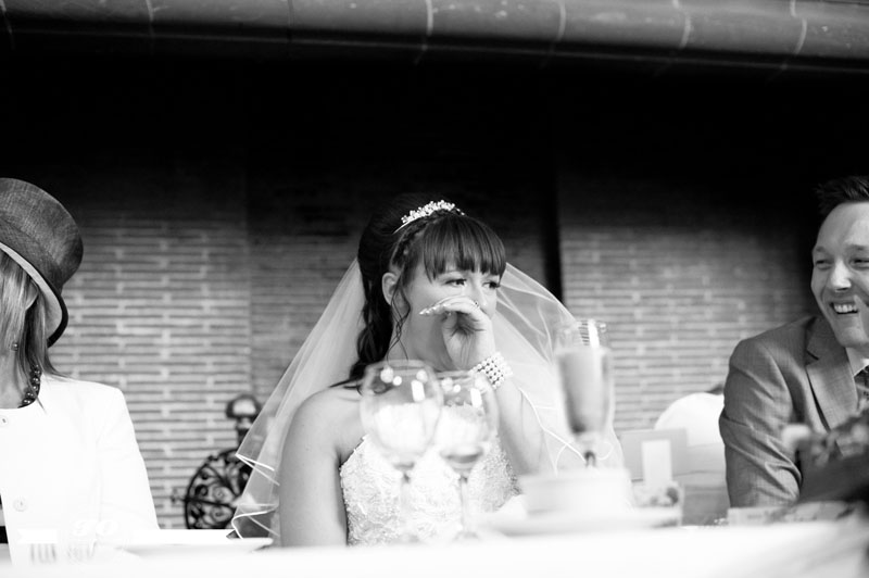 kelly & mike's wedding: bride giggling, abbey house hotel, barrow-in-furness