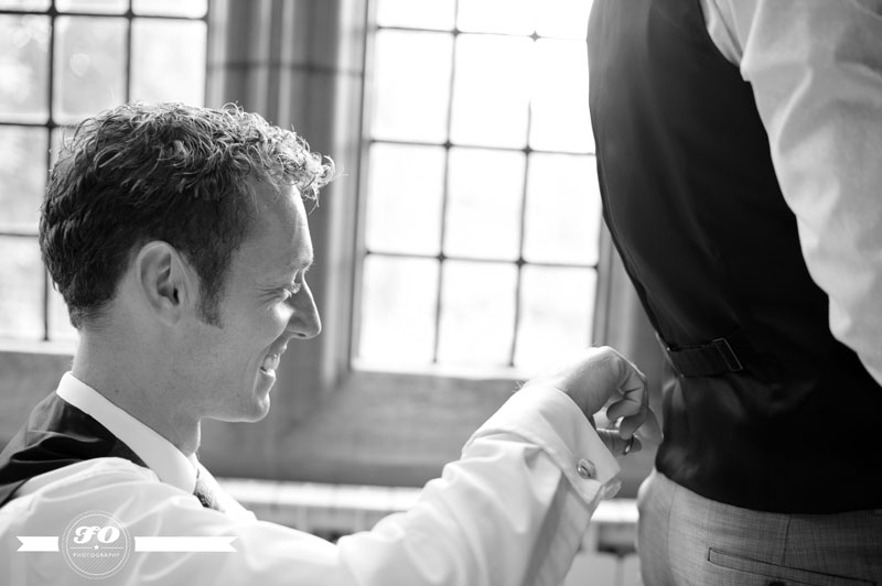 kelly & mike's wedding: best man at work on groom's outfit, Abbey House Hotel, barrow-in-furness