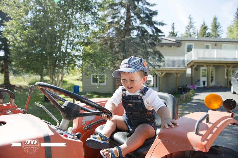 edmonton family lifestyle photographers, boy on tractor