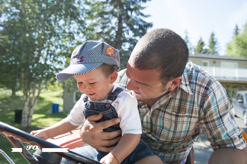 edmonton family lifestyle photographers, father and son on tractor