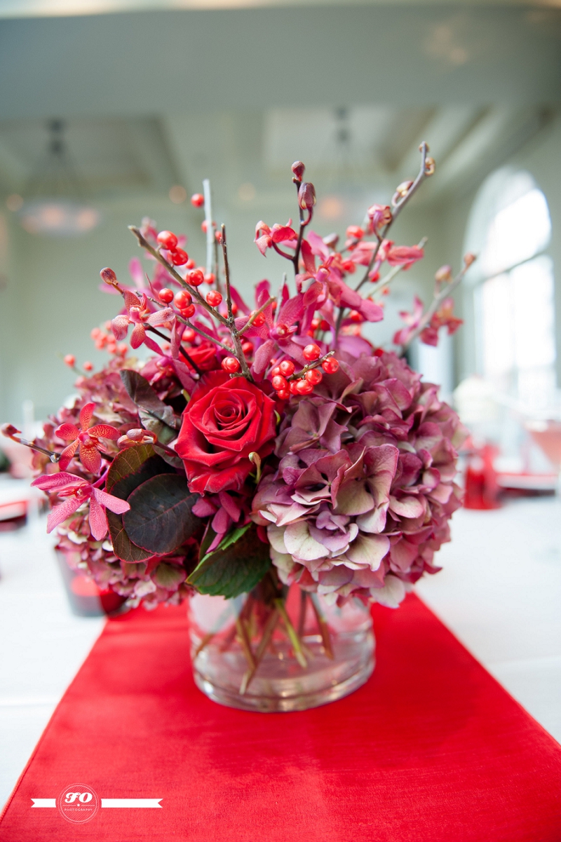 edmonton christmas wedding photographers, laurel's on whyte, antique hydrangeas, red paris roses, five friendship aranda orchids, smoke bush, ilex berries