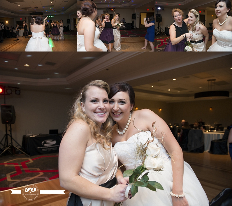 bouquet toss at wedding at four points by sheraton south hotel, edmonton weddding photographers
